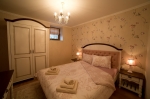 Ground floor of a guest house situated in the garden of the hotel