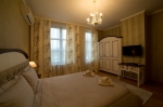 Upper floor of a guest house situated in the garden of the hotel